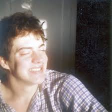 I see crooked eyes and full lips 😂 it may be a stretch but I've seen some  of the other posts