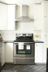 Off White Cabinets Light Tile Floor Dark Concrete Countertops Kitchen Flooring Off White Cabinets Grey Flooring