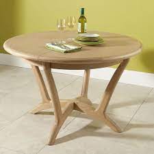 This dining table with a glass top is an excellent choice for rooms with limited space, as it can be collapsed when not in use. Hunters Bergen Round Extending Table Dining Tables