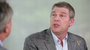 Dave Brandon, CEO of Toys “R” Us, discusses challenges in toyland with Dean  M. Eric Johnson.