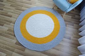Large rugs can dominate a room. Large Round Living Room Rug Round Rug Under Round Table Floor Rug Round Yellow Rug Braided Rug Toddler Room Decor Washable Rug Carpet Round Rugs Toddler Room Decor Floor Rugs