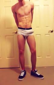 Boxer Briefs Boner Boy - a hot boy in tight boxer briefs highlights his prominent bulge. Intriguing underwear shot.