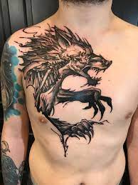 A tattoo of a wolf with red eyes or in flames is often found on those who identify with the forces of darkness. Werewolf By Chuck Day At 9 Dot Studios Burlington Ia Tattoos