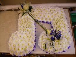 Wishing you peace and comfort. Unusual Tributes Musical Note Fleurtations Flowers