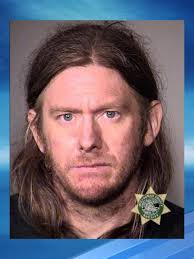 Police: Man broke into Gresham house with his cat, put