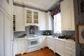 The work island offsets the all white kitchen with painted grey cabinets and a very practical white quartz counter. 38 Cool Trendy Paint Colors For Minimalist Houses Page 17 Of 40 Country Kitchen Interiors Interior Decorating Kitchen White Kitchen Units