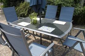 Black tabletop and black metal legs. Aisling 6 Seat Dining Set Culcita