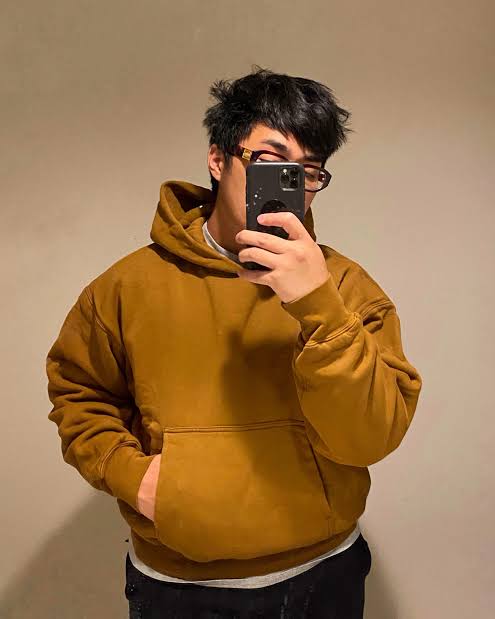 The iconic boxy and cropped fit profile of the Yeezy Gap hoodie line., AI generated