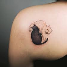 Black And White Cat Tattoo Designs Black And White Cat Couple Tattoo On The Left Shoulder Blade Animal Tattoos Cat Tattoo Small Black Cat Tattoos