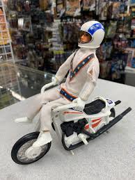 Robert craig knievel, professionally known as evel knievel, was an american stunt performer and entertainer. Evel Knievel W Black Seat Stunt Cycle Rogue Toys