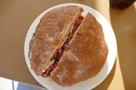 Place the ftira in the preheated oven for 20 minutes. File Ftira With Tuna In San Tumas 01 Jpg Wikimedia Commons