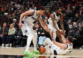 Luka Doncic, Dante Exum lead way after Kyrie Irving injury in Mavs' gutsy  win over Blazers