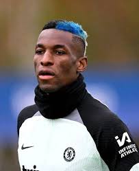 Football Player Dyes Hair Red to Represent Spain