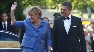 It is refugee integration week, and she is expected in cologne within the hour. Semi Naked Drug User Dances On Angela Merkel S Jet Bbc News
