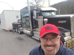 Easy does it for Shawn Johnson as he hauls this modular control house  across Pennsylvania for our friends at Modular Engineering. This over  dimensional building is loaded