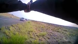 Isolated image of funny buy eyed plus size female manager in white formal shirt expressing astonishment, staring in full disbelief, shocked picture of stylish young overweight female employee wearing white shirt and large round earrings touching her neck. New Mexico State Trooper Chases Down Man Who Shot Her During Traffic Stop