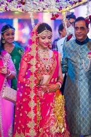 Image result for mehndi bride entrance with showering flowers