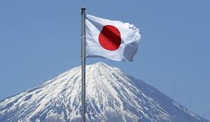 The national flag of japan is a white rectangular flag with a large red disc representing the sun at the center of the flag. Japan Flag