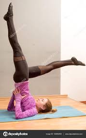 Sporty Girl On White Background Doing Shoulder Stand Exercise Asana Viparita Karani Upside Down Seal Pose Yoga One Leg Up Other Parallel The Floor Stock Photo C Elf 11 132494822