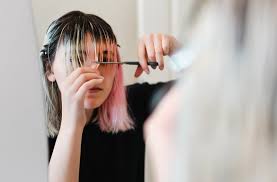 But if you're unable to do so then you may want to trim as needed. How To Trim Your Own Hair For The Best Results Well Good