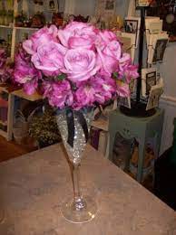 Photo Gallery Photo Of Champagne And Roses Centerpiece Glass Wedding Centerpieces Wedding Centerpieces Floral Arrangements