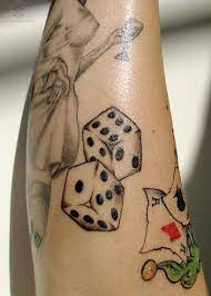 Dice Tattoo Images Designs Dice Tattoo Gambling Tattoo Tattoo On Arm