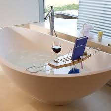 Bathtub tray caddy, bathtub shelf table, clawfoot tub accessories, luxury natural wooden bathtub tray with soap box, bath towel holder, wine glass holder, reading rack, tablet holder, phone tray etc. 5 Bamboo Bathtub Caddies That You Can Buy Right Now