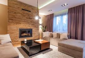 wandgestaltung wohnzimmer stein riemchen braun kamineinsatz contemporary modern interior design living room tiles home decor