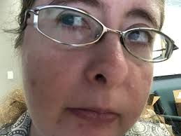 Look: Kitty is studying a very interesting book!