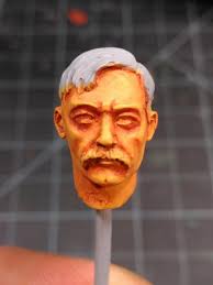 The last of the Gangs of Rome fighters that I'm painting is a black skinned  chap. I started with a base coat with Vallejo Model Colour German Camo  Black Brown and then