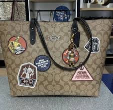 Coach has launched a collaboration with star wars, and all i have to say is that i am here for it and they can take all my money! Buy Nwt Coach Star Wars X Town Tote Bag Signature Canvas With Patches F88020 Online In Kuwait 303377748315