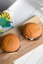 I love olives and mayo on burgers.in michigan where i grew up if you ordered a delux burger it was topped with lettuce, tomato, green olives and mayo. Creamy Olive Spread Topped Burger Who Needs A Cape