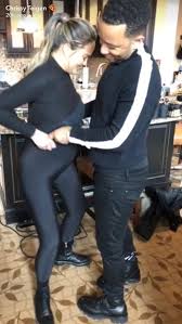 Getting Over the Hump! John Legend Helps Pregnant Wife Chrissy Teigen with  Her Spandex Leggings