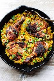 Rub the chicken with salt, pepper, and seasoning salt, and place on top of the vegetables in the dutch oven. One Pot Chicken Saffron Rice With Peas And Olives Eating European