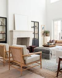 Use an adorable coffee table to display decor pieces and family photos. Macy Ottoman Mcgee Co