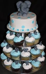 Elephant Cake With Matching Cupcakes In 2020 Boy Baby Shower Themes Baby Shower Cakes For Boys Baby Shower Cupcakes