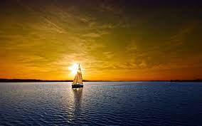 wallpapernarium fotografia de un velero en el mar durante el ocaso beautiful sunset sunset wallpaper amazing sunsets