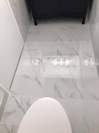 Maybe you would like to learn more about one of these? Home Decorators Collection Carrara Polished 12 In X 24 In Polished Porcelain Floor And Wall Tile 16 Sq Ft Case Nhdcarr1224p The Home Depot Porcelain Flooring Modern Floor Tiles Basement Bathroom Remodeling