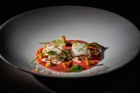 Rana Pescatrice E Finferli Con Infuso Di Pomodoro Affumicato E Tartufo Nero Dei Berici