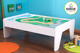 Raised edges to keep the spacious table to share. Amazon Com Kidkraft Train Table White Toys Games
