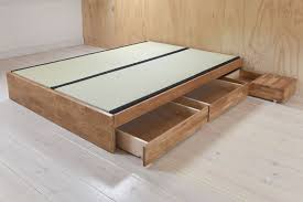 This type of king size platform bed allows extra functionality such as storage. King Size Oak Platform Storage Bed Futon Company