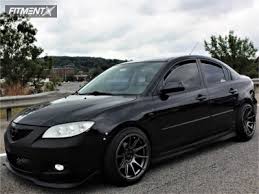 Image result for Sparkling Black 2007 Mazda3