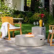 Santos Outdoor Circular Propane Fire Pit Table With Tank Holder By Christopher Knight Home White Grey Gray Stone Finish Outdoor Decor Gas Fire Pit Table Propane Fire Pit Table Fire Pit Table