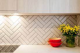 Next lay the rest of the tiles. Logie Interiors Herringbone Tile Double Herringbone Tile Double Herringbone