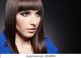 Alternately, it may taper downwards from the back to the sides. Young Woman Pageboy Haircut Looking Right Stock Photo Edit Now 89188990