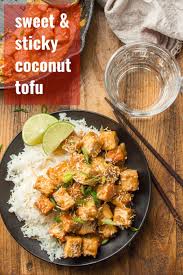 Crispy Pan Fried Tofu Is Drenched In A Rich Brown Sugar Coconut Milk Sauce And Served With A Sprinkling Of Toasted Coconut