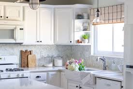 Have quartz countertops, white subway backsplash tile and oak. Why I Switched From Butcher Block Counters To Quartz Shades Of Blue Interiors
