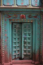 A shelf has been attached at the top in order to display more pictures or decorations. Old Doors India Varanasi Photograph By Stereostok