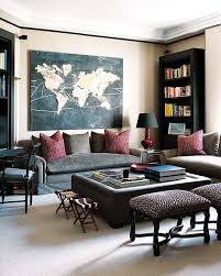 World Map Art And Color Scheme And Velvet Sofas With Images Blue Living Room Decor Family Room Decorating Living Room Decor