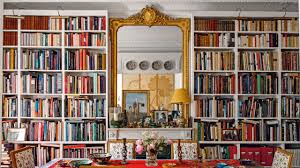 Here are some unconventional ways to use picture frames to display family photos. Nina Freudenberger On 5 Easy Ways To Decorate With Books Architectural Digest